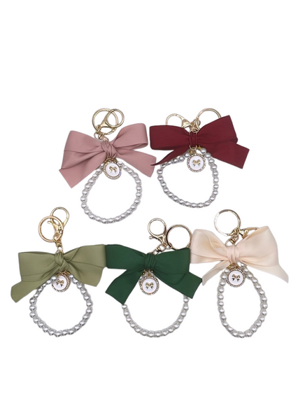 Pearl and bow charm