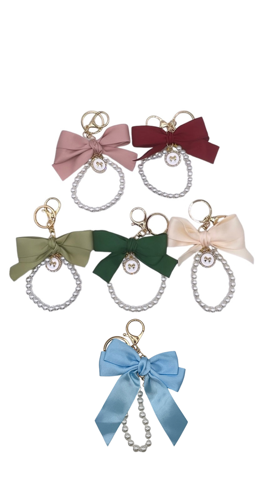 Pearl and bow charm